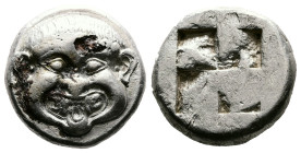 Macedon, Neapolis, circa 500-480 BC. AR Stater (19 mm, 9,61 g.). Facing gorgoneion with protruding tongue. Rev. Quadripartite incuse square. AMNG III....