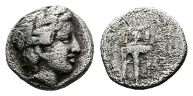 Macedon. Chalkidian League. Circa 425-420 BC. AR Obol (10mm, 1.07g.). Olynthos mint. Laureate head of Apollo right. Rev. Tripod. Unpublished in the st...