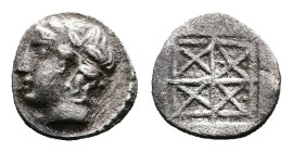 Macedon, Chalkidian League, Olynthos. Circa 432-348 BC. AR Trihemiobol (7 mm, 0,21 g.). Laureate head of Apollo to left. Rev. Quadripartite incuse squ...