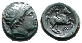 Kings of Macedon, Philip II 359-336 BC. AE (17mm, 6,55 g.). Uncertain mint in Macedonia. Diademed head of Apollo to right. Rev. ΦΙΛΙΠΠΟΥ Youth on hors...