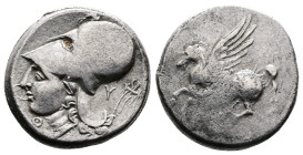 Akarnania, Thyrrheion, circa 320-280 BC. AR Stater (20 mm, 7,81 g.). Θ Pegasos flying left. Rev. Head of Athena to left, wearing crested Corinthian he...