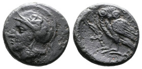 Akarnania, Thyrrheion, circa 300-250 BC. AE (16 mm, 4,15 g.). Helmeted head of Athena to right, wearing crested Attic helmet, ornamented with griffin....