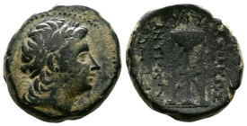 Seleukid Kingdom, Antiochos III the 'Great', 223-187 BC. AE (22 mm, 13,62g.). Antioch mint. Laureate head of Apollo right. Rev. BAΣIΛEΩΣ ANTIOXOY, Tri...