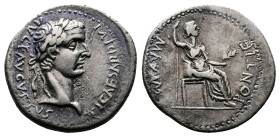 Tiberius, 14-37 AD. AR Denarius. (18 mm. 3,60 g.). Lyons mint. TI CAESAR DIVI AVG AVGVSTVS, laureate head right. Rev. PONTIF MAXIM, Livia, as Pax, hol...