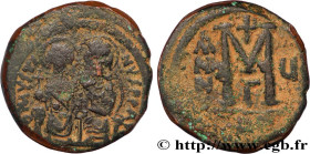 JUSTIN II and SOPHIA
Type : Follis 
Date : an 6 
Mint name / Town : Nicomédie 
Metal : copper 
Diameter : 28,5  mm
Orientation dies : 6  h.
Weight : 1...