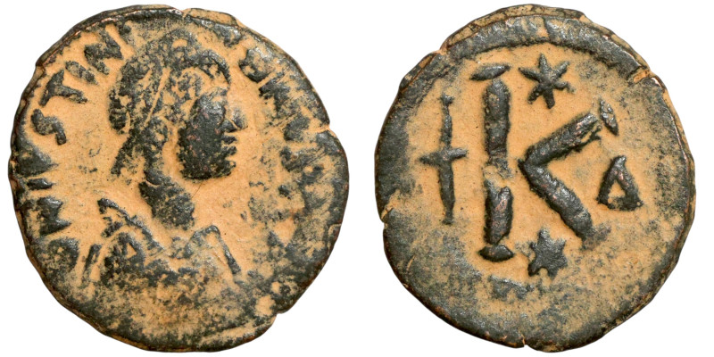 Justinian I. Half Follis.. Obverse: :D N IVSTINIANVS P P AVG, diademed bust Reve...