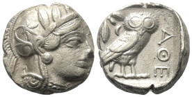 Attika. Athen.

 Tetradrachme (Silber). Ca. 454 - 404 v. Chr.
Vs: Kopf der Athena mit ölzweiggeschmücktem attischem Helm, Ohranhänger und Halskette...