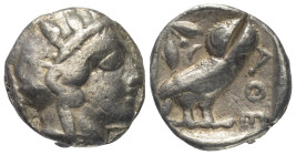 Attika. Athen.

 Tetradrachme (Silber). Ca. 454 - 404 v. Chr.
Vs: Kopf der Athena mit ölzweiggeschmücktem attischem Helm, Ohranhänger und Halskette...