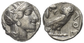 Attika. Athen.

 Tetradrachme (Silber). Ca. 454 - 404 v. Chr.
Vs: Kopf der Athena mit ölzweiggeschmücktem attischem Helm, Ohranhänger und Halskette...