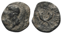 Judäa. Herodische Dynastie. Agrippa I. (37 - 43 n. Chr.).

 Prutah (Bronze). 40 / 41 n. Chr. (Jahr 5).
Vs: Kopf des jugendlichen Agrippa II. links....