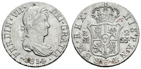 Ferdinand VII (1808-1833). 2 reales. 1814. Madrid. GJ. (Cal-829). Ag. 5,88 g. Laureate bust. Choice VF. Est...150,00. 

Spanish descripction: Fernan...