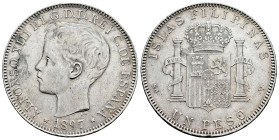 Alfonso XIII (1886-1931). 1 peso. 1897. Manila. SGV. (Cal-122). Ag. 25,08 g. Minor nicks on edge. Minor marks. Choice VF. Est...150,00. 

Spanish de...
