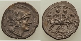 Anonymous (ca. 211 BC or later). AR quinarius (15mm, 2.20 gm, 3h). XF, flan crack. Rome. Head of Roma right, wearing winged Attic helmet with griffin ...