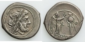 Anonymous. Ca. 211-208 BC. AR victoriatus (17mm, 3.21 gm, 2h). XF. Rome. Laureate head of Jupiter right, dotted border / ROMA, Victory standing right ...