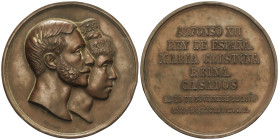 Peseta System: Alfonso XII
Medalla Boda Real Alfonso XII y María Cristina. 29 Noviembre 1879. Anv.: Bustos sobrepuestos a derecha. Rev.: Leyenda en 7...