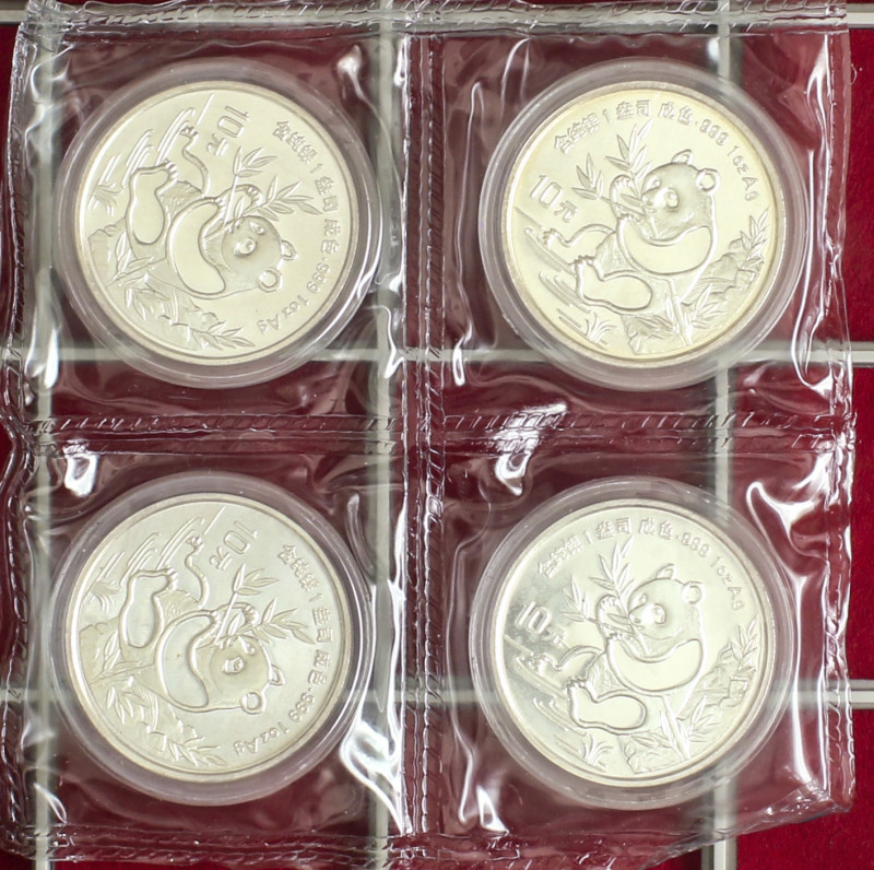 World Coins: China
Lote 4 monedas 10 Yuan. 1991. AR. Panda en arroyo comiendo b...