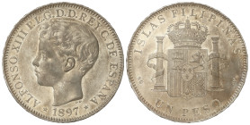 Peseta System: Alfonso XIII
1 Peso. 1897. MANILA. S.G.-V. (Leves rayitas). Brillo original con leve pátina oscura irregular, muy bella. MUY ESCASA AS...