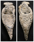 Weight 11,69 gr - Diameter 43 mm. Pilgrim's Holy Water Ampulla with inscription on, 10th-14th century AD. A lead-alloy ampulla with tapering body, fla...