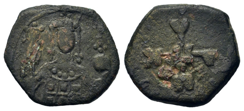 Manuel I Comnenus (1143-1180). Æ Half Tetarteron (8,4mm, 2.1g). Crowned half len...