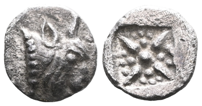 GREEK CARIA. Uncertain mint. Ca. 450-400 BC. AR obol. Head of bull Rev. uncertai...