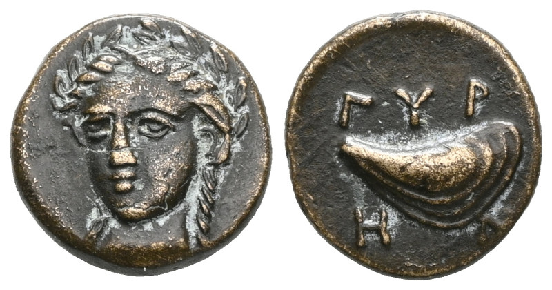 Aeolis, Grynion Æ12. 3rd Century BC. Three-quarter facing head of Apollo, turned...