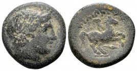 Kingdom of Macedon, Philip II. Uncertain mint in Macedon, 315-295 BC. Æ16, 6.0 g. Head of Apollo right / ΦIΛIΠΠOY youth on horseback right; below: spe...