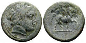 Kingdom of Macedon, Philip II. Uncertain mint in Macedon, 315-295 BC. Æ20, 8.82 g. Head of Apollo right / ΦIΛIΠΠOY youth on horseback right; before: E...