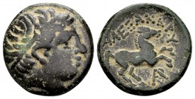 Kingdom of Macedon, Alexander III. Uncertain mint in Macedon, 336-323 BC. Æ16, 4.17 g.  Head of Apollo right / ΑΛEΞΑΝΔΡΟΥ horse rearing right; below: ...