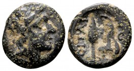 Thessaly, Oitaioi. Ca. 279-168 BC.Æ dichalkon, 2.1 g. Laureate head of Apollo right / ΟΙΤΑΙ Ω[Ν] spear head above, jawbone of a boar below; monogram b...