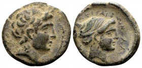 Thessaly, Perrhaiboi. 4th century BC. Æ dichalkon, 5.1 g. (APIΣ) laureate head of Apollo right / ΠΕΡΡΑΙΒΩΝ head of nymph right, hair in sphendone. BCD...