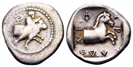 Thessaly, Pharkadon. Ca 440-400 BC. AR hemidrachm, 2.69 g. Thessalos nude, wearing petasos and chlamys, restraining forepart of bull right by band hel...