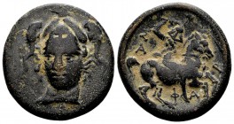Thessaly, Pharsalos. 4th century BC. Æ trichalkon, 8.42 g. Helmeted bust of Athena facing, looking left / ΦΑΡΣΑ thessalian horseman rearing right, bra...