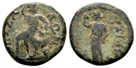 Thessaly, Koinon of Thessaly. Temp. Domitian, 81-96 AD. Æ assarion, 3.39 g. ΘEΣΣA ΛΩN, Apollo seated left on rocks, raising right arm over head / ΛAPI...