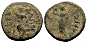 Thessaly, Koinon of Thessaly. Temp. Domitian. AD 81-96. Æ assarion, 2.74 g. ΘΕΣΣ ΑΛΩN Apollo seated left on altar, raising hand over head / ΛΑΡΙΣΑ nym...