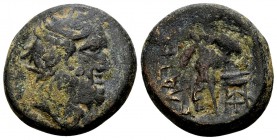 Phokis, Elateia. 2nd century BC. AE18, 8.65 g. Head of Asklepios right / EΛATEΩN helmeted Athena right with shield and spear, tripod to right; counter...