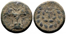 Phokis, Phokian league. Struck under Phalaikos, 351 BC and later. Æ22, 9.4 g. ΦΩ KE ΩN three facing bull’s heads with sacrificial fillets in a triangl...