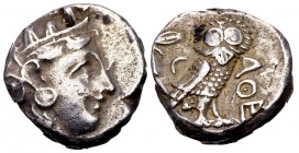 Attika, Athens. Ca. 350–294 BC. AR tetradrachm, 17.14 g.Helmeted head of Athena right / AΘE Owl standing right, head facing; olive sprig and crescent ...