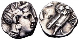 Attika, Athens. Ca. 350–294 BC. AR tetradrachm, 17.12 g.Helmeted head of Athena right / AΘE Owl standing right, head facing; olive sprig and crescent ...