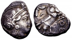 Attika, Athens. Ca. 350–294 BC. AR tetradrachm, 17.04 g.Helmeted head of Athena right / AΘE Owl standing right, head facing; olive sprig and crescent ...