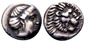 Caria, Knidos. Ca 350-320 BC. AR drachm, 3.5 g. Telesiphron, magistrate. Head of Artemis right / [T]EΛEΣI[ΦΡΩΝ] head and leg of lion right. BMC 31-2. ...