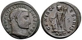 Maximinus Daia. Antioch, 310 AD. Æ 1/2 follis, 6.88 g. GAL VAL MAXIMINVS NOB CAES laureate head right / GENIO CAESARIS Genius standing left, with pate...