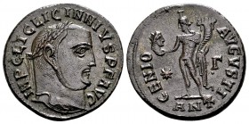 Licinius I. Antioch, 311-313 AD. Æ follis, 4.98 g. IMP C LIC LICINIUS PF AVG laureate head right / GENIO AUGUSTI Genius standing left, holdng head of ...