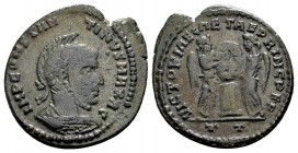 Constantine I. Ticinum, 318-319 AD. Æ follis, 3.01 g. IMP CONSTANTINVS MAX AG laureate, helmeted, cuirassed bust right / VICTORIAE LAETAE PRINC PEP tw...