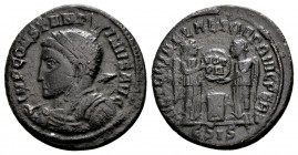 Constantine I. Siscia, 318 AD. Æ follis, 3.14 g. IMP CONSTANTINVS AVG helmeted, cuirassed bust left, spear over right shoulder and shield on left / VI...