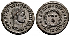 Constantine II as Caesar. Siscia, 321-324 AD. Æ follis, 3.62 g. CONSTANTINVS IVN NOB C laureate bust right / CAESARVM NOSTRORVM around VOT X in wreath...