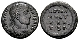 Constantine I. Thessalonica, 318-319 AD. Æ follis, 3.97 g. CONSTANTINVS AVG laureate, cuirassed bust right / VOT XX MVLT •XXX• TSΓ• in four lines with...