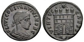 Constantius II as Caesar . Arelate, 325-326 AD. Æ follis, 2.70 g. FL IVL CONSTANTIVS NOB C, laureate, draped bust right.VIRTVS CAESS campgate with ope...