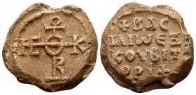 Byzantine, Basilios. exkoubitor. Byzantine lead seal (23 mm, 14.15 gram). Ca. 7th century AD. Cruciform monogram ΘEOTOKE BOHΘEI / +BAC|IΛIW EΞ|KOVBIT|...