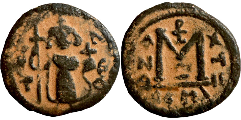 Constans II (641-668) Follis. Obverse: Imperial figure holding cross and globus ...