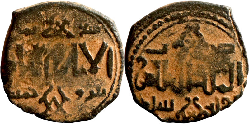 Seljuk (1037–1157, bronze coin. Obverse: Arabic inscription. Reverse: Arabicc in...